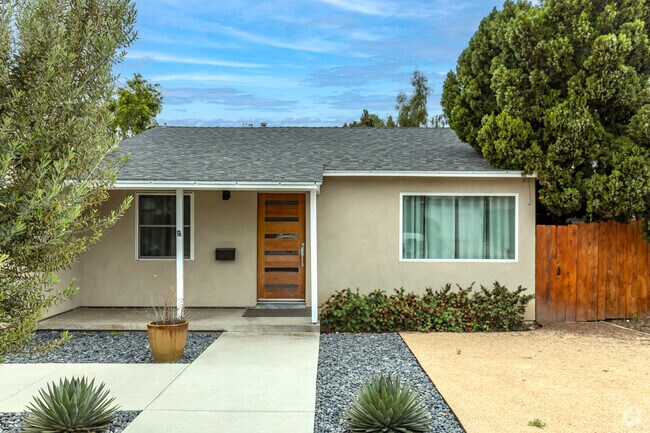 Many bungalows in El Cerrito feature stucco exteriors and front walkways.