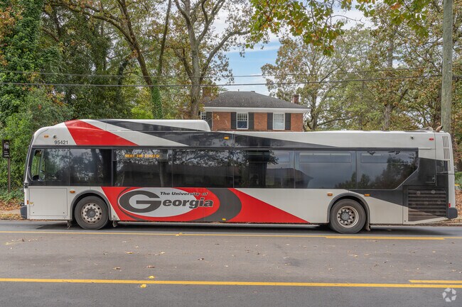 The UGA bus offers free rides all throughout Milledge Avenue Historic District.