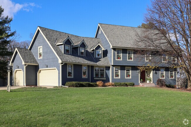 Fitchburg Colonial revival homes feature classic symmetry.