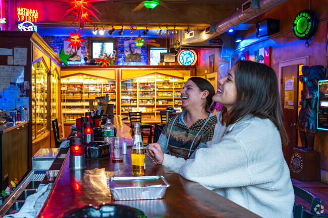 The warm atmosphere at Famous Cigar Bar on the Lower East Side.