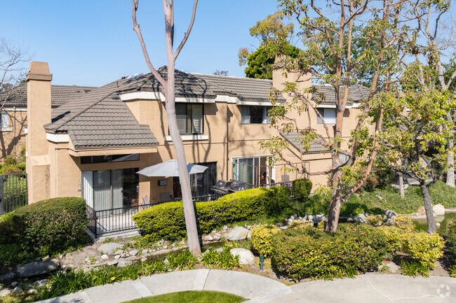 Millstream luxury condominiums is a gated community in the Washington neighborhood of Huntington Beach.