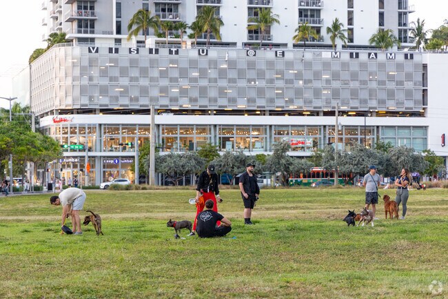 Midtown locals bring their pets and get together at the informal central park.