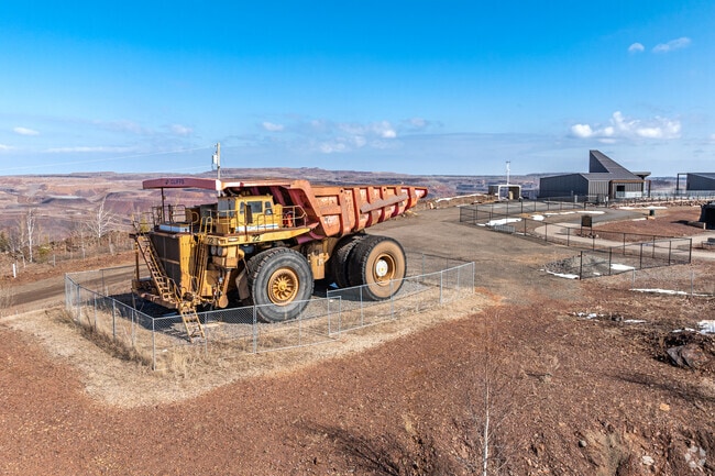 The Hibbing Hull Rust Pit uses 240 ton trucks with a 41 cubic-yard capacity.