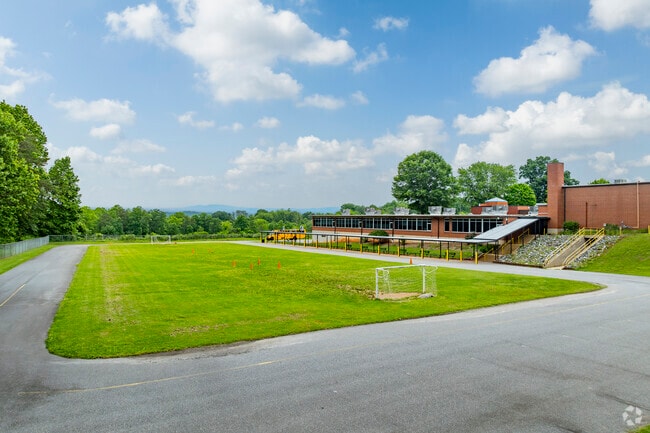 Students enjoy large open outdoor spaces for activities at Forest Hill Elementary School.