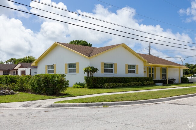 Large ranch-style home in Riviera Beach neighborhood.
