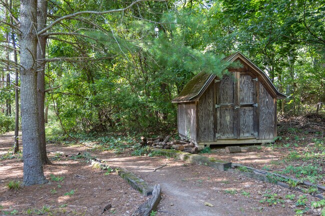 Visitors to Nellies Cave Park enjoy the greenery along the Arboretum Trail.