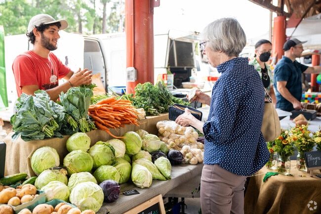 Carrboro Farmers' Market features local vendors selling fresh produce.