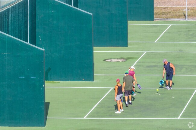 Play a game of pickleball with friends at Jack McCluskey Rainbow Park in Pembroke Pines, FL.