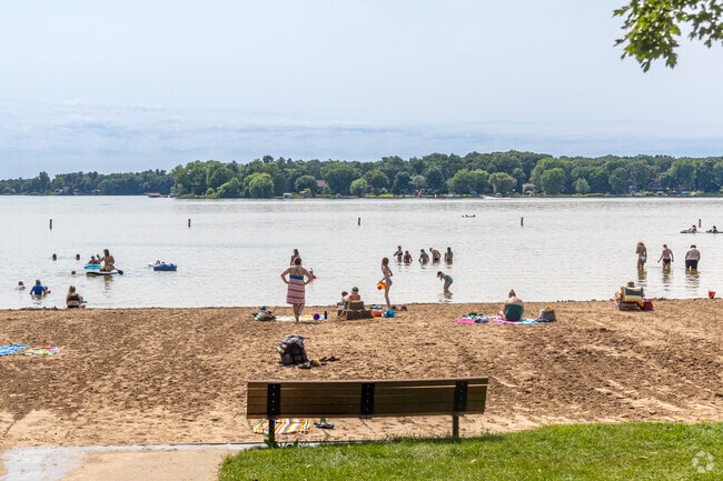 Coon Lake swimming beach at Coon Lake County Park provides a respite for residents from the summer heat.