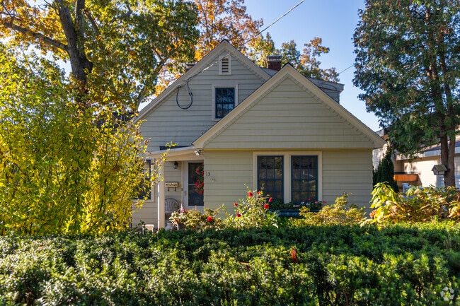Charming Cape Cod homes are tucked away all over in the fall tree lines of Edgemere, MA.