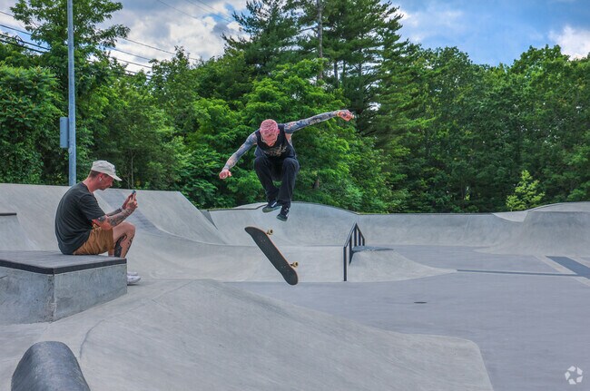 West End locals catch some air on their boards as they master tricks and show off their skills at Chris Rice Skate Park, a lively hub of skate culture and community.