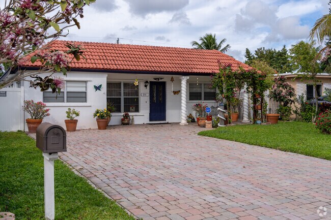 This Mediterranean-style home is a rare find in Welwyn Manor, adding a unique architectural flair to the neighborhood.