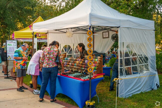 Vendors line the park during the Latin Jazz and Art Festival in Casselberry.