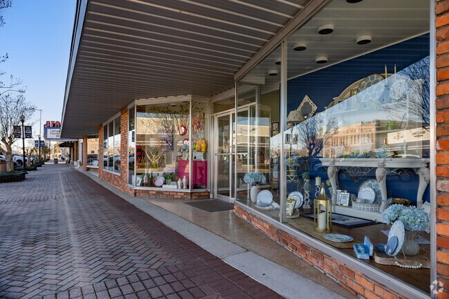 Local businesses and stores line the sidewalks of downtown Jesup.