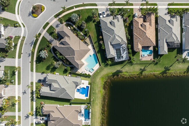 Many homes in Valencia Sound have backyard pools.