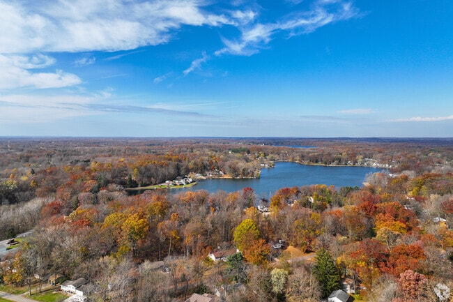 Sugar Bush Knolls is a lake-centered neighborhood near Brady Lake with scenic views.
