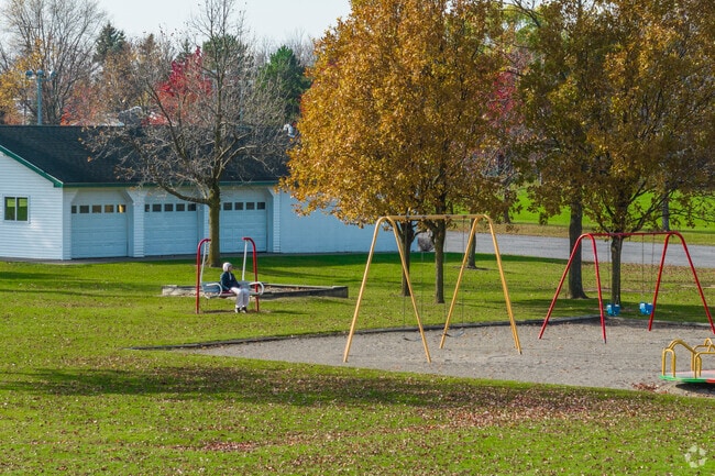 A woman sits peacefully at a local neighborhood park in East Amherst.