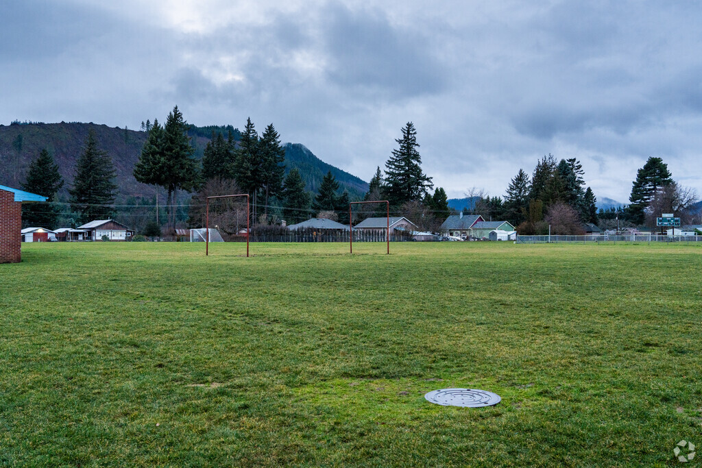 The sports field sits behind the elementary school.