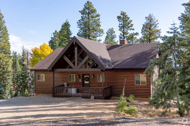 Scattered throughout the neighborhood, rustic log cabins give Duck Creek Village residents easy access to scenic hiking trails and the natural beauty that surrounds them.