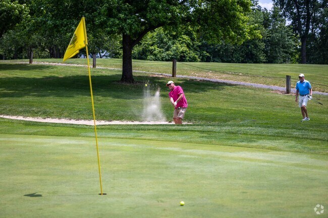 Enjoy a round of golf in Springhill at Wildwood Golf Club.