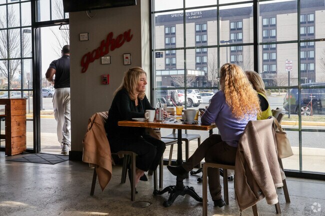 Locals enjoy a cup of joe and delicious food at Trummer's Coffee & Wine Bar near Kingsbrooke.