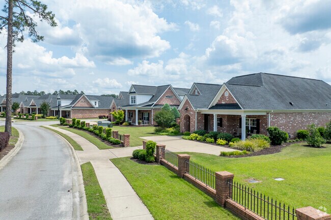 This street in Pontiac-Elgin has walkable sidewalks and fenced front yards.