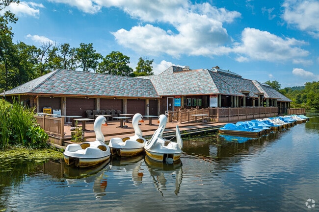 Verona Park’s boathouse is a hub for lake activities, from paddleboats to fishing.