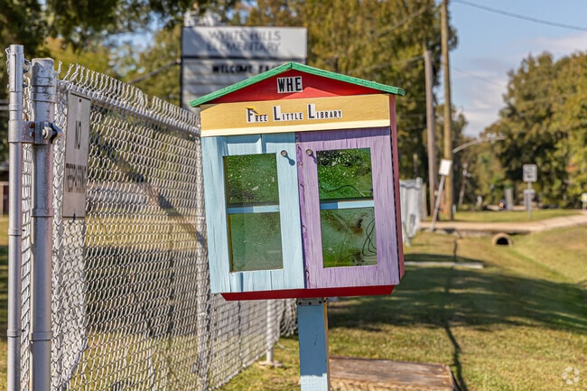 Pick up a new read or leave one behind at the neighborhood’s Little Free Library.