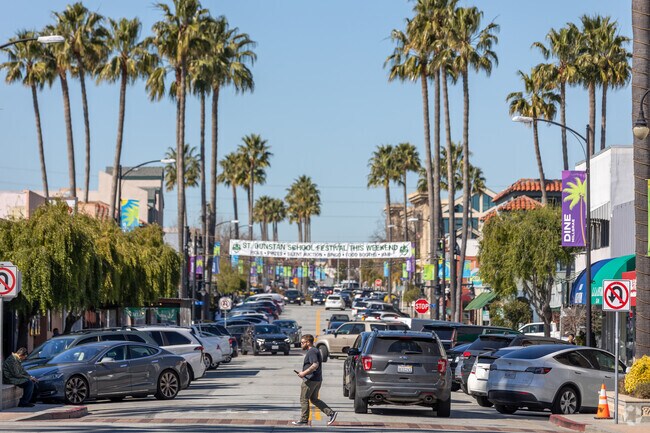 Downtown Millbrae buzzes with energy, featuring shops, dining, and palm-lined streets.