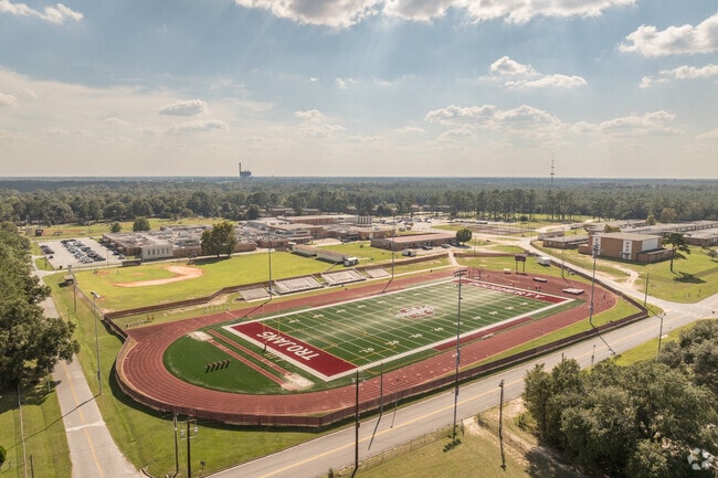 Dougherty Comprehensive High School enrolls about 869 students.