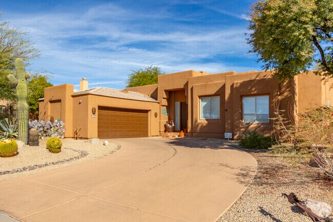 A few homes in Troon North feature more of a Santa Fe style.