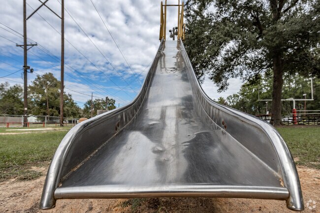 Children will love the tall, metal slides of Patton Village found in a small, local playground.