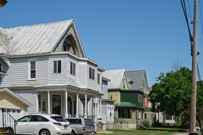 Rows of gabled homes with unique additions line many streets in Downtown La Crosse.