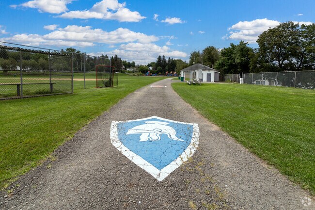 Three laps around Woodan Park’s walking path equal one mile in Jessup, PA.