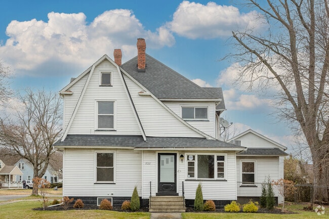 Cape Cod home with a tidy lawn in the North End neighborhood.