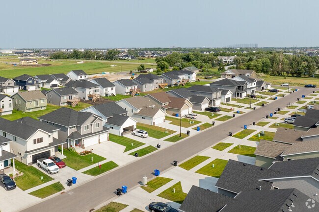 Wide streets, ample sidewalk space, and big grassy yards are a hallmark of Davies.