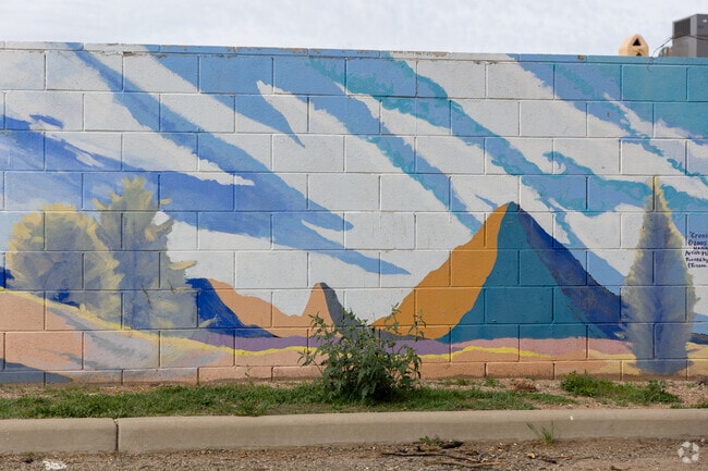 A mountain mural at Navajo Wash Park in Hedrick Acres.