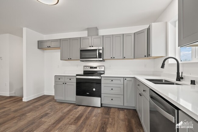 Actual unit has a SS fridge