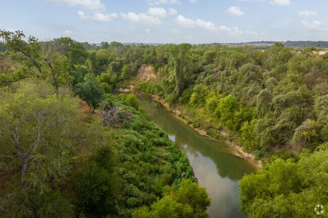 The San Antonio River flows past River Crossing Park in Elmendorf.