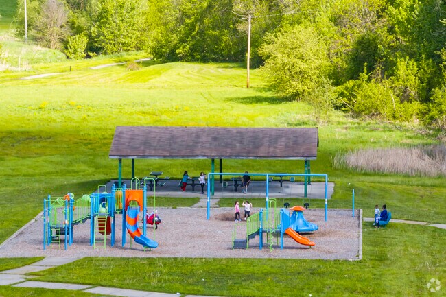 Adventurous local kids love the colorful playground at Kearsley Park.