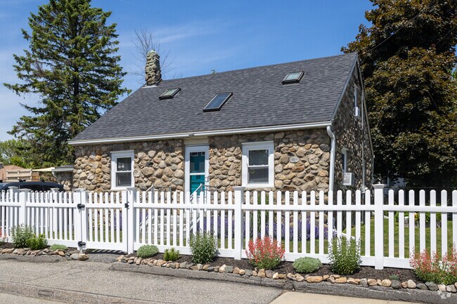 This small home built out of stone is unique to Central Saco.