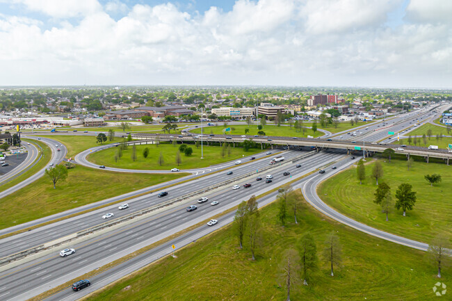 Aerial image overlooking I-10 towards the Clearview Palms Shopping Center and Tulane Lakeside Hospital in the Clearview Estates neighborhood