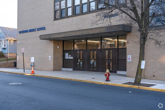 The teacher to student radio in North Arlington Middle School is 12-1.