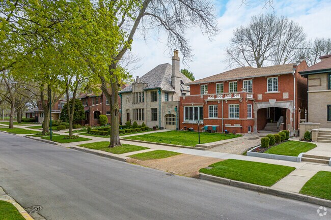 Pristine lawns and beautiful rows of houses adorn the Jackson Park Highlands neighborhood.