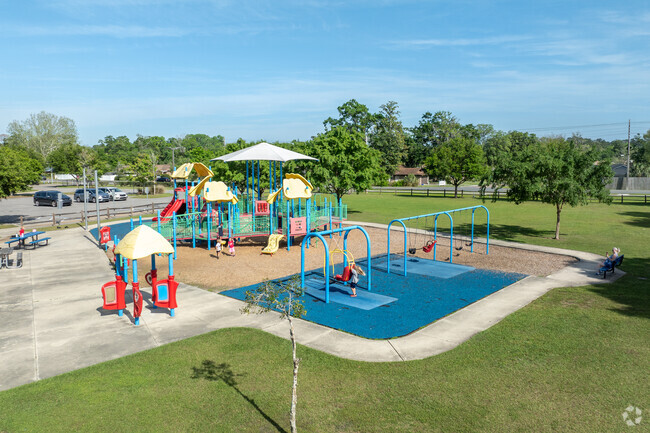 Families come and play at the park and enjoy the beautiful weather in Lakeside.
