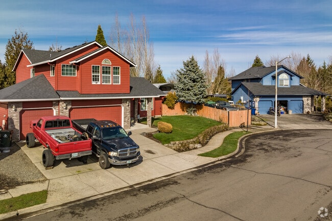 Kelly Creek features colorful homes and wide driveways.