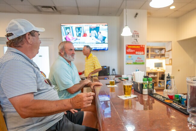 Bardmoor Golf Club has a bar that welcomes members to grab a drink.