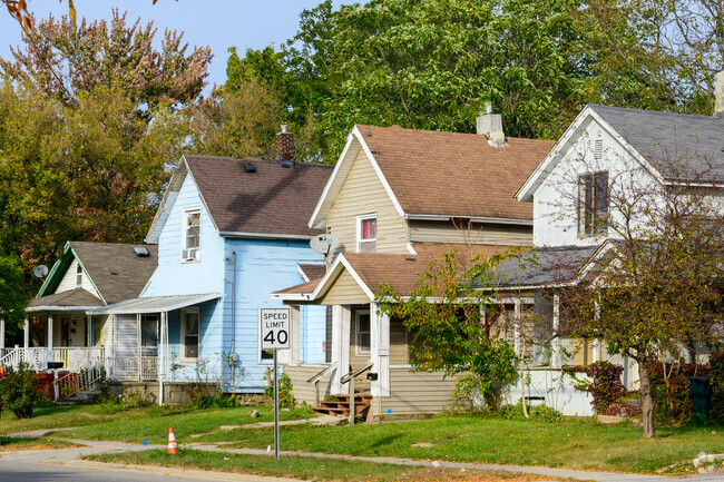 A row of Gablefront homes line a quiet street of Old Town.