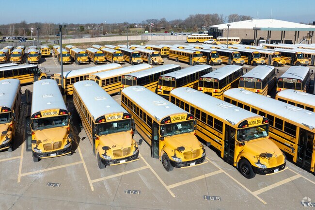Buses wait for school to end in Wentzville to take kids home to Foristell.