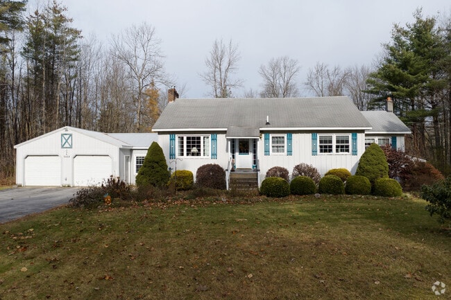 A cape cod with a detached garage in Galway.